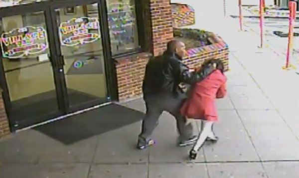 Unidentified Man Attacks A Woman Outside Of Taxi Office [VIDEO]