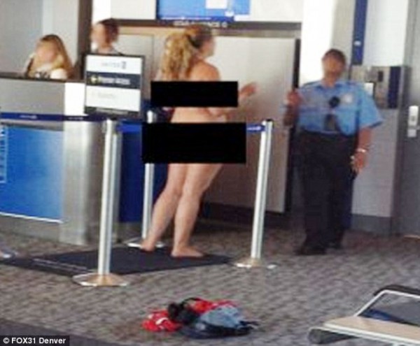 No need For A Strip Search! Woman Gets Naked In Middle Of Airport