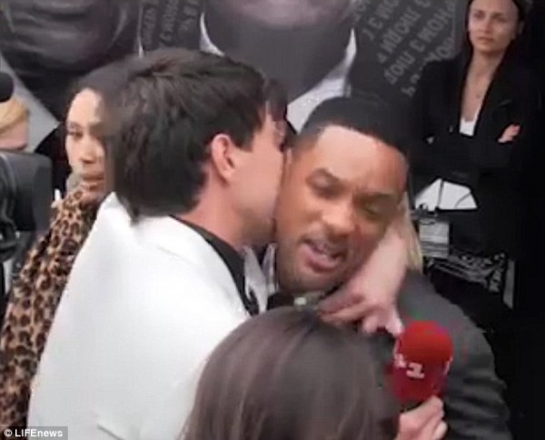 Will Smith slaps TV prankster for trying to kiss him on the lips on red carpet