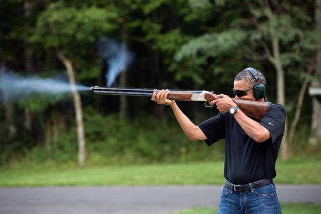 White House releases photo of Obama firing a gun