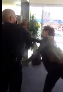 Watch this police officer slug a woman in the face